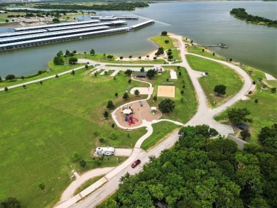 Experience lakeside living at its finest in this 6-bedroom, 4 on Stewart Peninsula Golf Course in Texas - for sale on GolfHomes.com, golf home, golf lot