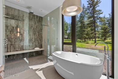 Welcome to a meticulously crafted masterpiece overlooking the on Gozzer Ranch Golf and Lake Club in Idaho - for sale on GolfHomes.com, golf home, golf lot