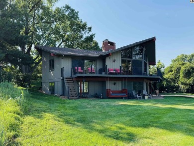 Privately set on a quiet drive, this Colorado-style home offers on Prairie Dunes Country Club in Kansas - for sale on GolfHomes.com, golf home, golf lot