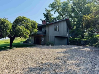Privately set on a quiet drive, this Colorado-style home offers on Prairie Dunes Country Club in Kansas - for sale on GolfHomes.com, golf home, golf lot