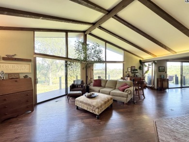 Privately set on a quiet drive, this Colorado-style home offers on Prairie Dunes Country Club in Kansas - for sale on GolfHomes.com, golf home, golf lot