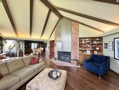 Privately set on a quiet drive, this Colorado-style home offers on Prairie Dunes Country Club in Kansas - for sale on GolfHomes.com, golf home, golf lot