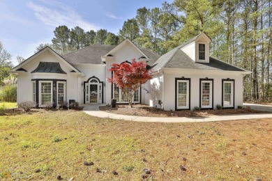 Beautiful Ranch home in North PTC with three bedrooms, two baths on Canongate At Flat Creek Club in Georgia - for sale on GolfHomes.com, golf home, golf lot