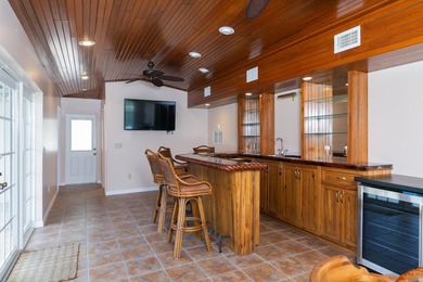 ENTERTAINER'S DREAM WITH FABULOUS VIEW OF THE SAINTS PUBLIC GOLF on Club Med Sandpiper in Florida - for sale on GolfHomes.com, golf home, golf lot