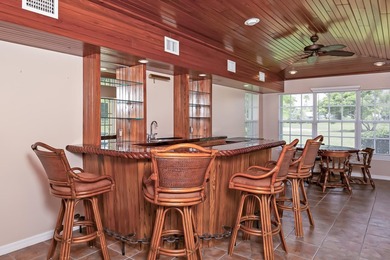 ENTERTAINER'S DREAM WITH FABULOUS VIEW OF THE SAINTS PUBLIC GOLF on Club Med Sandpiper in Florida - for sale on GolfHomes.com, golf home, golf lot