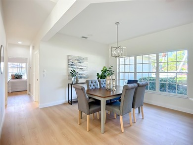 Absolute stunner and an exceptional value. This fully remodeled on The Meadows Golf and Country Club in Florida - for sale on GolfHomes.com, golf home, golf lot