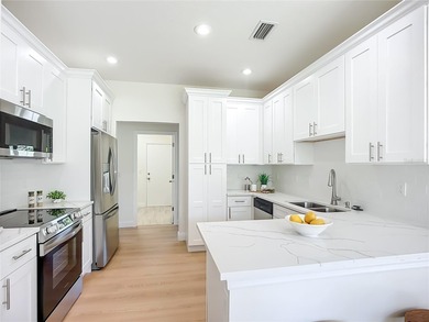 Absolute stunner and an exceptional value. This fully remodeled on The Meadows Golf and Country Club in Florida - for sale on GolfHomes.com, golf home, golf lot