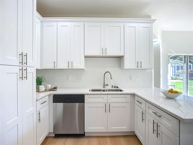 Absolute stunner and an exceptional value. This fully remodeled on The Meadows Golf and Country Club in Florida - for sale on GolfHomes.com, golf home, golf lot