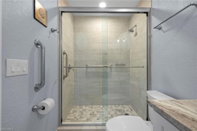 First time ever offered, this stunning and completely remodeled on West Bay Beach and Golf Club in Florida - for sale on GolfHomes.com, golf home, golf lot