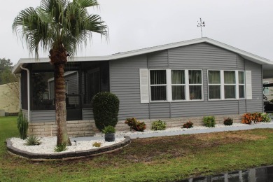 Beautiful (FULLY FURNISHED)  Not carport furniture.   Exterior: on Schalamar Creek Golf and Country Club in Florida - for sale on GolfHomes.com, golf home, golf lot