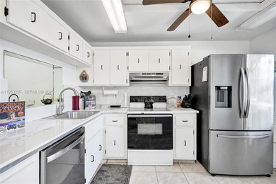 Step into comfort and style with this beautifully updated on Inverrary Country Club in Florida - for sale on GolfHomes.com, golf home, golf lot