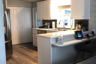 Beautiful (FULLY FURNISHED)  Not carport furniture.   Exterior: on Schalamar Creek Golf and Country Club in Florida - for sale on GolfHomes.com, golf home, golf lot