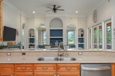 Luxurious family living all on one level in the esteemed gated on Regatta Bay Golf and Country Club in Florida - for sale on GolfHomes.com, golf home, golf lot