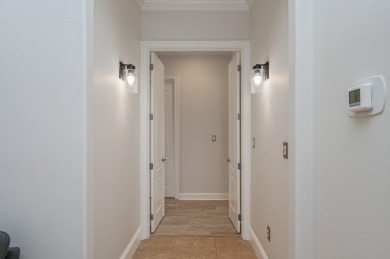 Luxurious family living all on one level in the esteemed gated on Regatta Bay Golf and Country Club in Florida - for sale on GolfHomes.com, golf home, golf lot