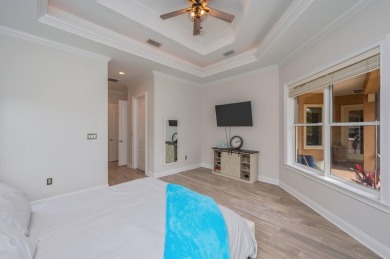 Luxurious family living all on one level in the esteemed gated on Regatta Bay Golf and Country Club in Florida - for sale on GolfHomes.com, golf home, golf lot
