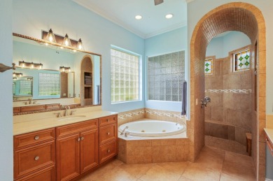 Luxurious family living all on one level in the esteemed gated on Regatta Bay Golf and Country Club in Florida - for sale on GolfHomes.com, golf home, golf lot