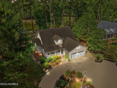 Nestled among the pines on this .76 acre lot is a beautiful on Cypress Landing Golf Club in North Carolina - for sale on GolfHomes.com, golf home, golf lot