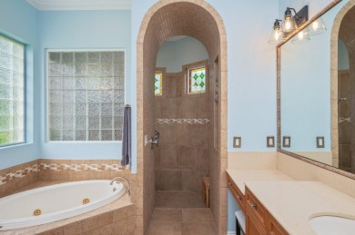 Luxurious family living all on one level in the esteemed gated on Regatta Bay Golf and Country Club in Florida - for sale on GolfHomes.com, golf home, golf lot