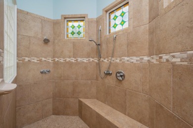 Luxurious family living all on one level in the esteemed gated on Regatta Bay Golf and Country Club in Florida - for sale on GolfHomes.com, golf home, golf lot