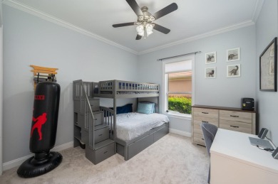 Luxurious family living all on one level in the esteemed gated on Regatta Bay Golf and Country Club in Florida - for sale on GolfHomes.com, golf home, golf lot