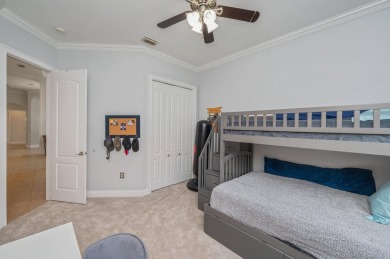 Luxurious family living all on one level in the esteemed gated on Regatta Bay Golf and Country Club in Florida - for sale on GolfHomes.com, golf home, golf lot