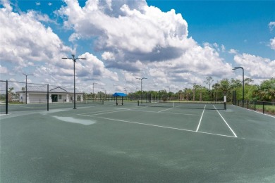 Nestled in the serene and highly sought-after resort community on Heritage Landing Golf  in Florida - for sale on GolfHomes.com, golf home, golf lot