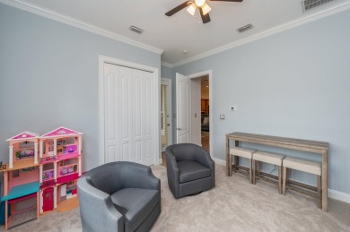 Luxurious family living all on one level in the esteemed gated on Regatta Bay Golf and Country Club in Florida - for sale on GolfHomes.com, golf home, golf lot