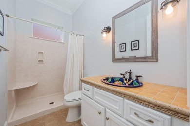 Luxurious family living all on one level in the esteemed gated on Regatta Bay Golf and Country Club in Florida - for sale on GolfHomes.com, golf home, golf lot