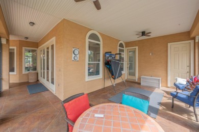 Luxurious family living all on one level in the esteemed gated on Regatta Bay Golf and Country Club in Florida - for sale on GolfHomes.com, golf home, golf lot