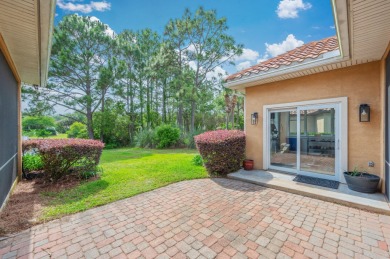 Luxurious family living all on one level in the esteemed gated on Regatta Bay Golf and Country Club in Florida - for sale on GolfHomes.com, golf home, golf lot