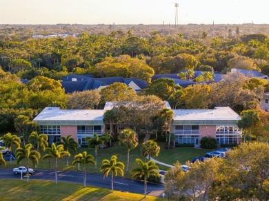Remarkably renovated 1st floor corner unit located in Vista on Vero Beach South Golf Course in Florida - for sale on GolfHomes.com, golf home, golf lot
