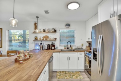 Remarkably renovated 1st floor corner unit located in Vista on Vero Beach South Golf Course in Florida - for sale on GolfHomes.com, golf home, golf lot