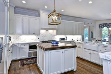 Enjoy refined living in this stately golf-front brick home in on Two Rivers Country Club in Virginia - for sale on GolfHomes.com, golf home, golf lot