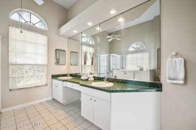 Experience panoramic WATER VIEWS in the highly sought-after on Suntree Country Club in Florida - for sale on GolfHomes.com, golf home, golf lot
