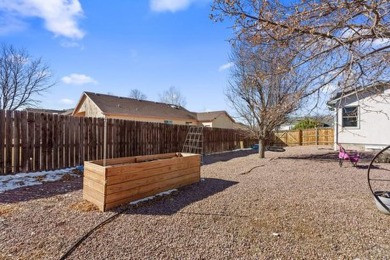 Beautifully landscaped home in the golf course area of Pueblo on Desert Hawk At Pueblo West in Colorado - for sale on GolfHomes.com, golf home, golf lot