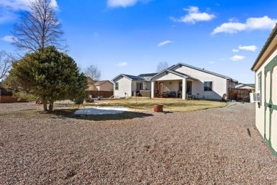 Beautifully landscaped home in the golf course area of Pueblo on Desert Hawk At Pueblo West in Colorado - for sale on GolfHomes.com, golf home, golf lot