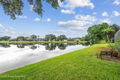 Experience panoramic WATER VIEWS in the highly sought-after on Suntree Country Club in Florida - for sale on GolfHomes.com, golf home, golf lot
