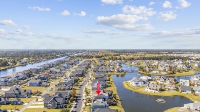 An exceptional four-bedroom, three-and-a-half-bathroom home on Myrtlewood Golf Course and Club  in South Carolina - for sale on GolfHomes.com, golf home, golf lot