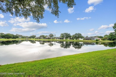 Experience panoramic WATER VIEWS in the highly sought-after on Suntree Country Club in Florida - for sale on GolfHomes.com, golf home, golf lot