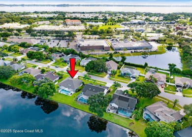 Experience panoramic WATER VIEWS in the highly sought-after on Suntree Country Club in Florida - for sale on GolfHomes.com, golf home, golf lot