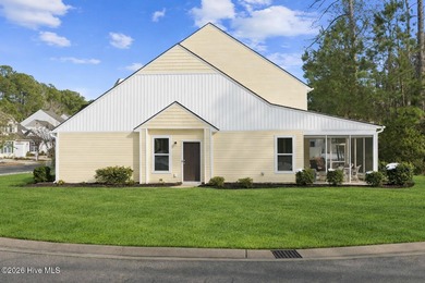 Welcome to 301 Bulkhead Bend, a bright and spacious end-unit in on Carolina Shores Golf Course in North Carolina - for sale on GolfHomes.com, golf home, golf lot