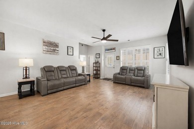 Welcome to 301 Bulkhead Bend, a bright and spacious end-unit in on Carolina Shores Golf Course in North Carolina - for sale on GolfHomes.com, golf home, golf lot