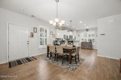 Welcome to 301 Bulkhead Bend, a bright and spacious end-unit in on Carolina Shores Golf Course in North Carolina - for sale on GolfHomes.com, golf home, golf lot