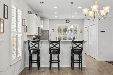 Welcome to 301 Bulkhead Bend, a bright and spacious end-unit in on Carolina Shores Golf Course in North Carolina - for sale on GolfHomes.com, golf home, golf lot