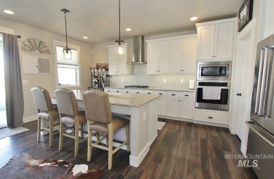 Experience refined Idaho living in this stunning 3-bed, 2-bath on Hunters Point Golf Club in Idaho - for sale on GolfHomes.com, golf home, golf lot