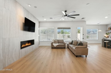 Modern Mountain Living Reimagined.  Discover elevated luxury in on Estrella Mountain Ranch Golf Course in Arizona - for sale on GolfHomes.com, golf home, golf lot