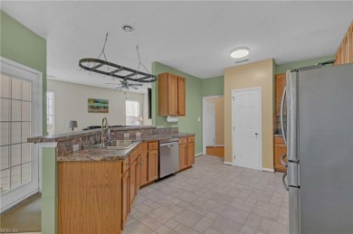 Welcome to this beautifully maintained four-bedroom on Kiln Creek Golf and Country Club in Virginia - for sale on GolfHomes.com, golf home, golf lot