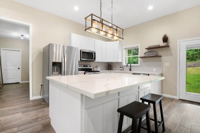 Enjoy peaceful living with golf course views in this beautifully on Rayburn Country Club in Texas - for sale on GolfHomes.com, golf home, golf lot