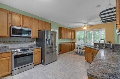 Welcome to this beautifully maintained four-bedroom on Kiln Creek Golf and Country Club in Virginia - for sale on GolfHomes.com, golf home, golf lot