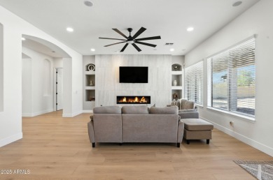 Modern Mountain Living Reimagined.  Discover elevated luxury in on Estrella Mountain Ranch Golf Course in Arizona - for sale on GolfHomes.com, golf home, golf lot